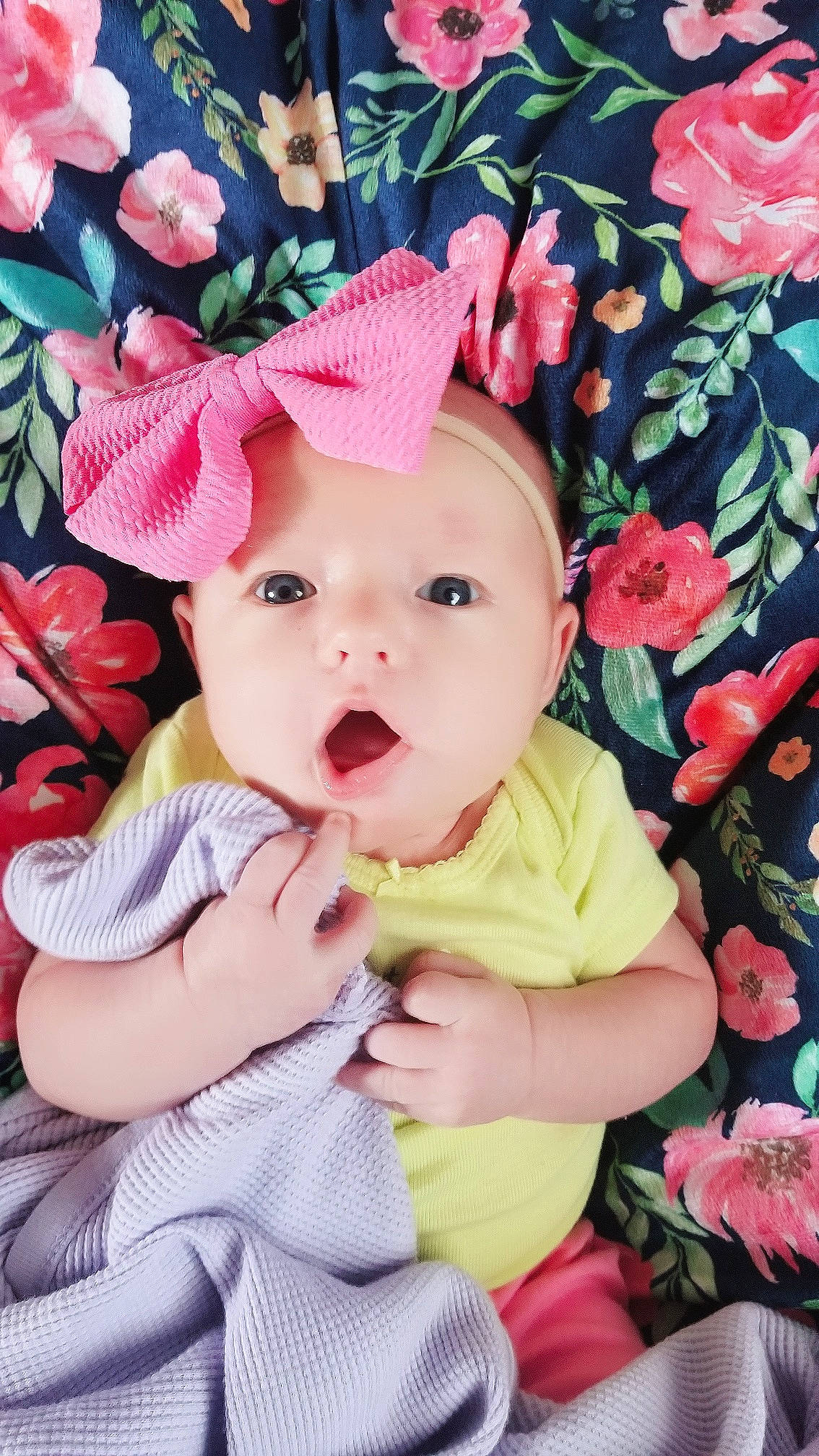 Emmalyn is registered to the contest to win money with this photo: baby, baby_toddler_clothing, cheek, child, fashion_accessory, flower, hat, headgear, person, petal, pink, plant, rose, toddler