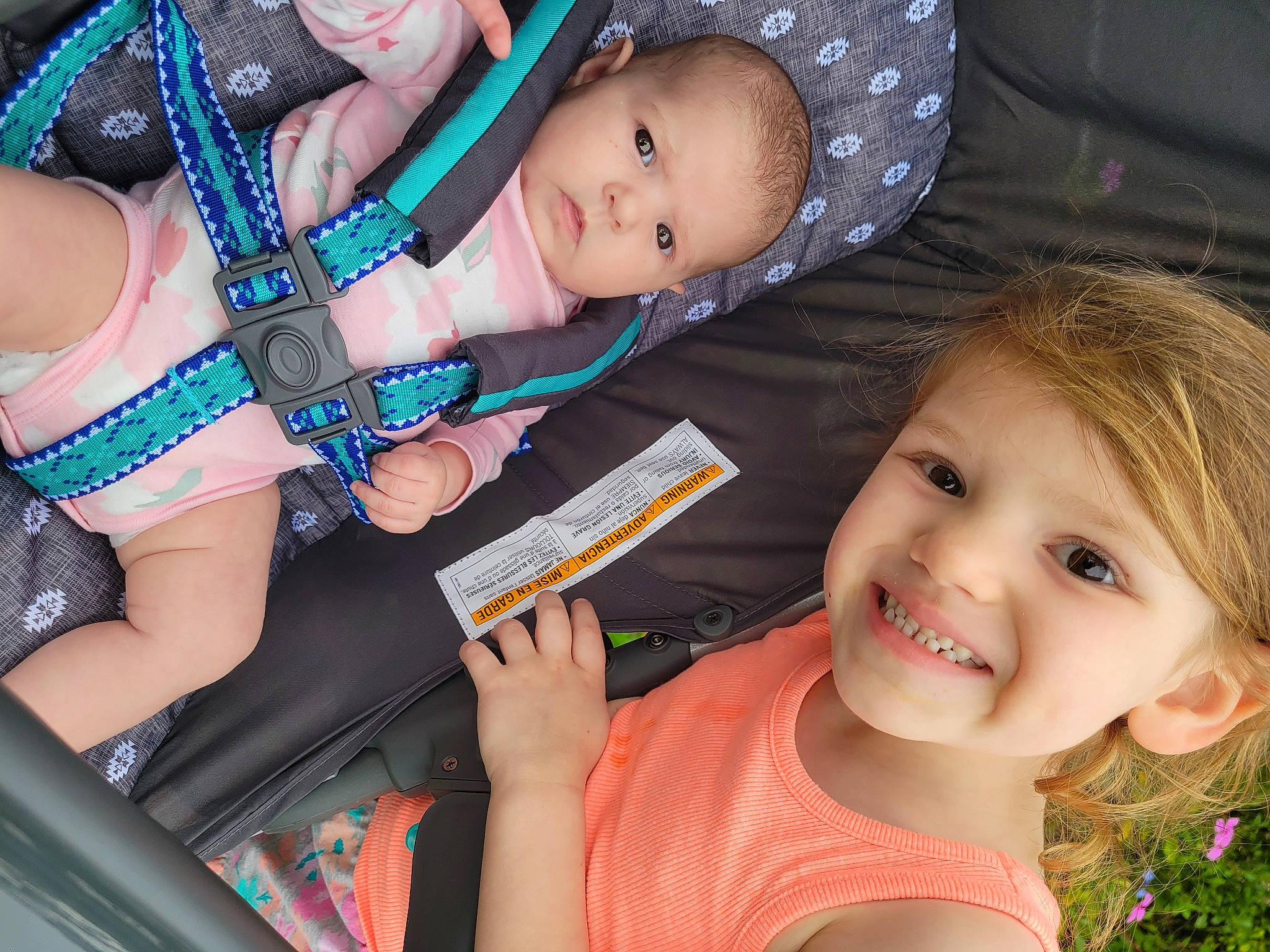 Mallory is registered to the contest to win money with this photo: baby, baby_toddler_clothing, cheek, child, eye, face, facial_expression, finger, gesture, happy, head, iris, joy, mouth, nail, nose, organ, people, person, photograph