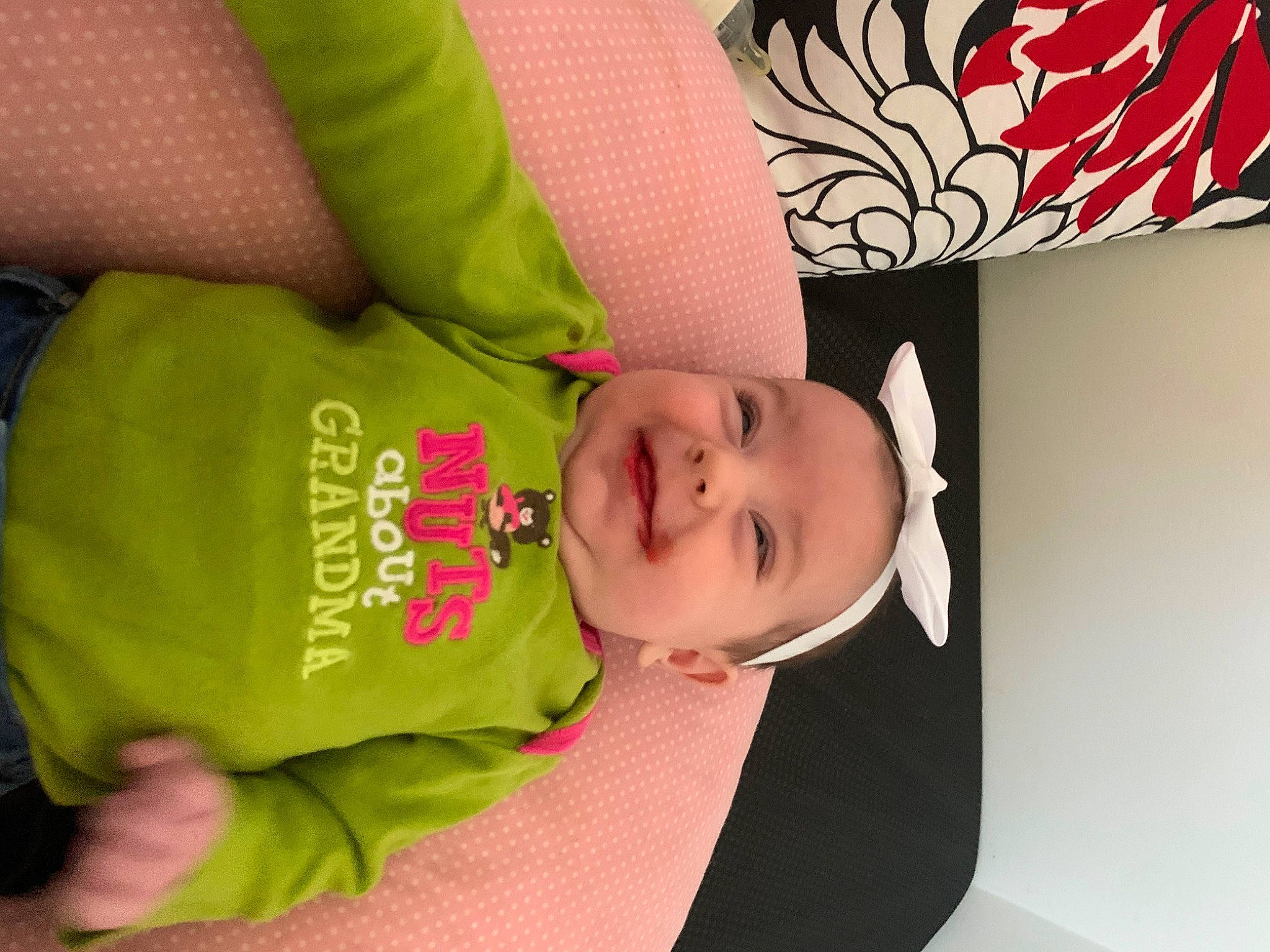 Leona is registered to the contest to win money with this photo: baby, baby_products, baby_toddler_clothing, cheek, child, comfort, eyelash, fashion_accessory, font, happy, hat, joy, pattern, person, pink, product, skin, sleeve, smile, toddler