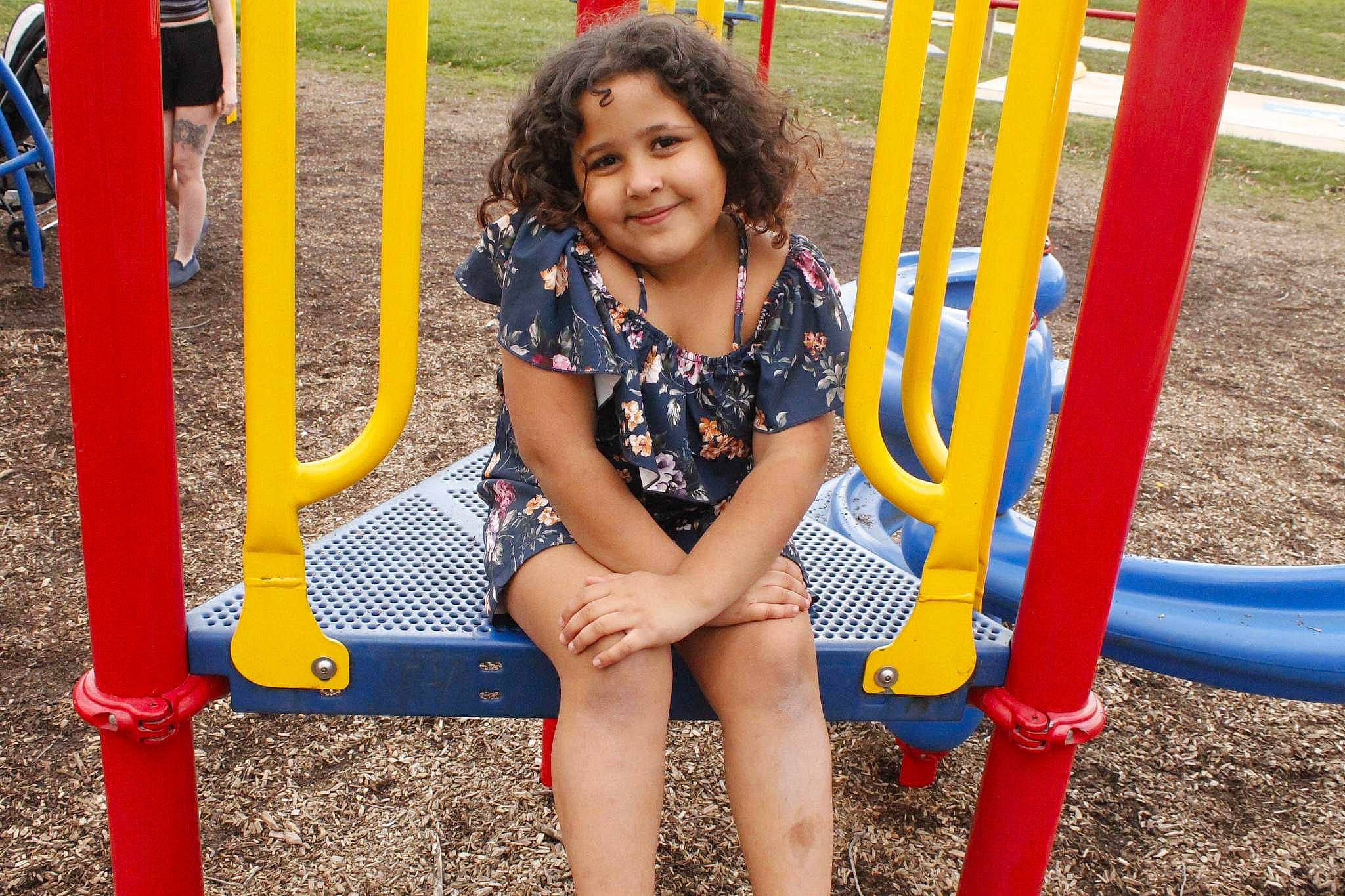 Zamyrah joined the competition — help win amazing prizes! child, chute, city, electric_blue, fun, grass, happy, joy, leisure, outdoor_play_equipment, outdoor_recreation, person, play, playground, recreation, shorts, sitting, smile, snapshot, summer