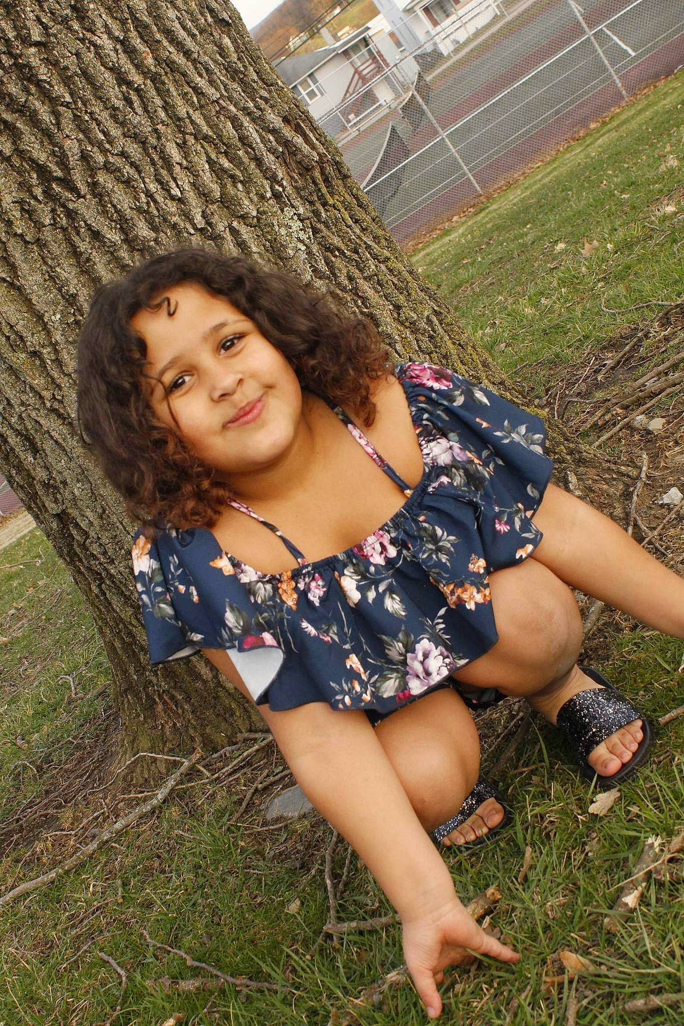 Zamyrah joined the competition — help win amazing prizes! black_hair, eye, face, fence, flash_photography, fun, grass, grass_family, green, happy, joy, leg, long_hair, people_in_nature, person, plant, skin, smile, summer, thigh