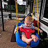 baby, swing, outdoor, child, play, smile, happy, toys, feet, ropes, blue, red, yellow, porch, home, window, clothing, person, fun, daytime