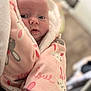 baby, blanket, bunny_print, child, closeup, clothing, cozy, cute, expression, face, indoor, infant, love_text, newborn, person, pink, portrait, soft, warm, wrapped