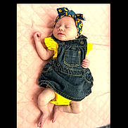 Mclane joined the competition — help win amazing prizes! adorable, baby, child, cute, denim_dress, headband, indoors, infant, lying_down, newborn, peaceful, pink_blanket, portrait, quilted_blanket, sleeping, small_feet, small_hands, soft_lighting, sunflower_pattern, yellow_clothing