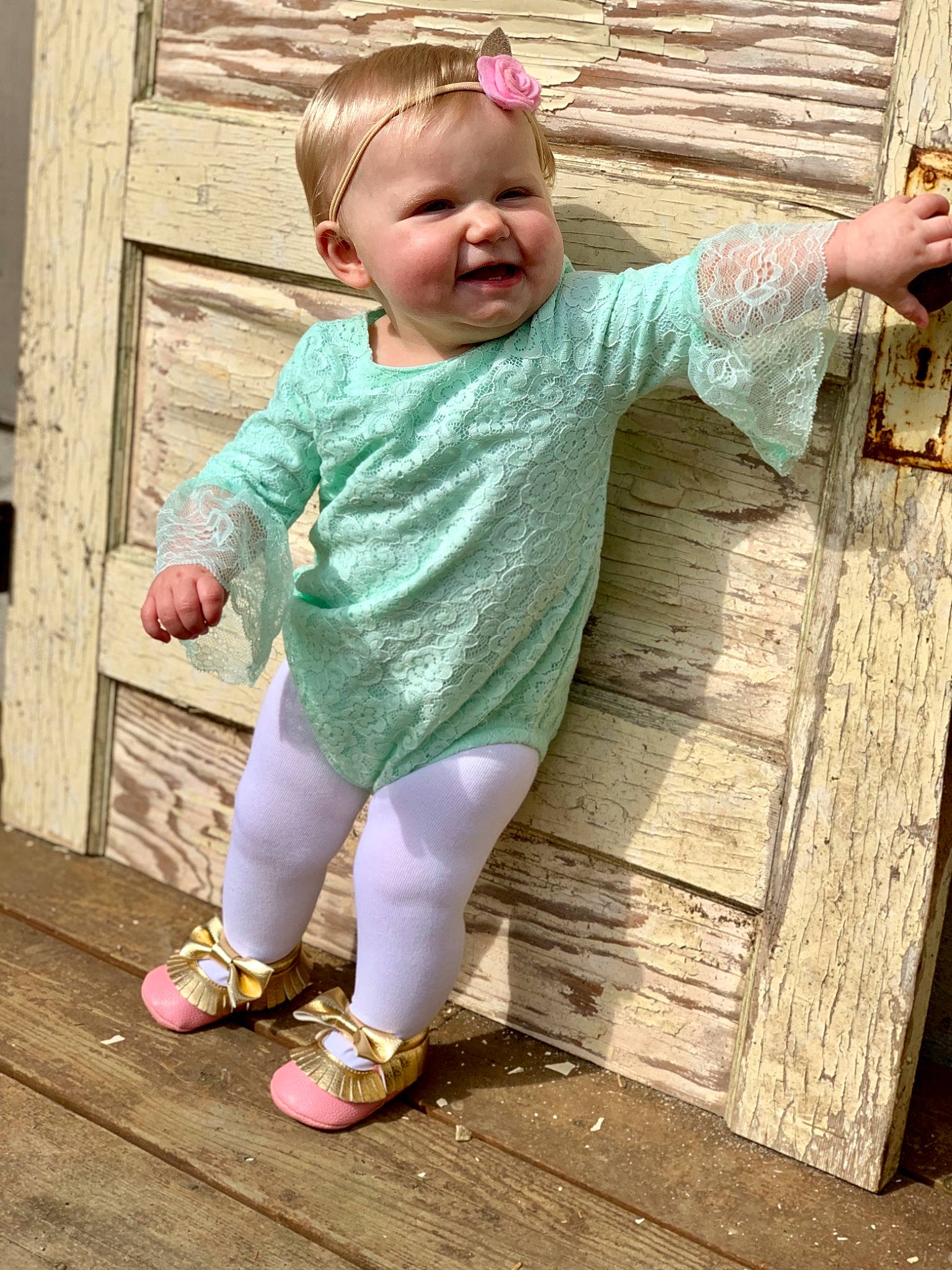 Mckinlee joined the competition — help win amazing prizes! baby_toddler_clothing, child, footwear, person, pink, play, shoe, smile, toddler, wood