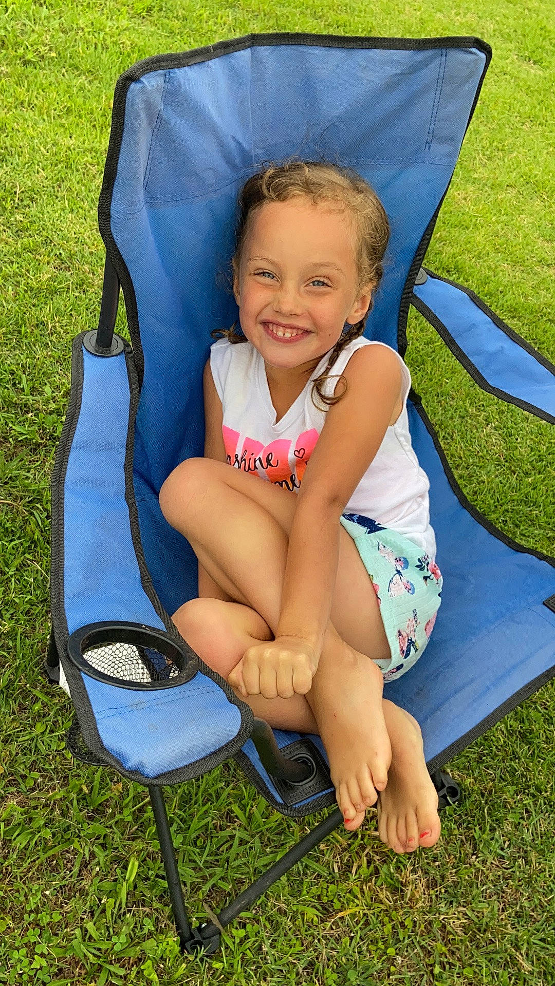 Elizabeth joined the competition — help win amazing prizes! blue, chair, comfort, face, flip_flops, fun, grass, happy, human_body, joy, lap, leg, leisure, people_in_nature, person, recreation, shoe, smile, sneakers, summer