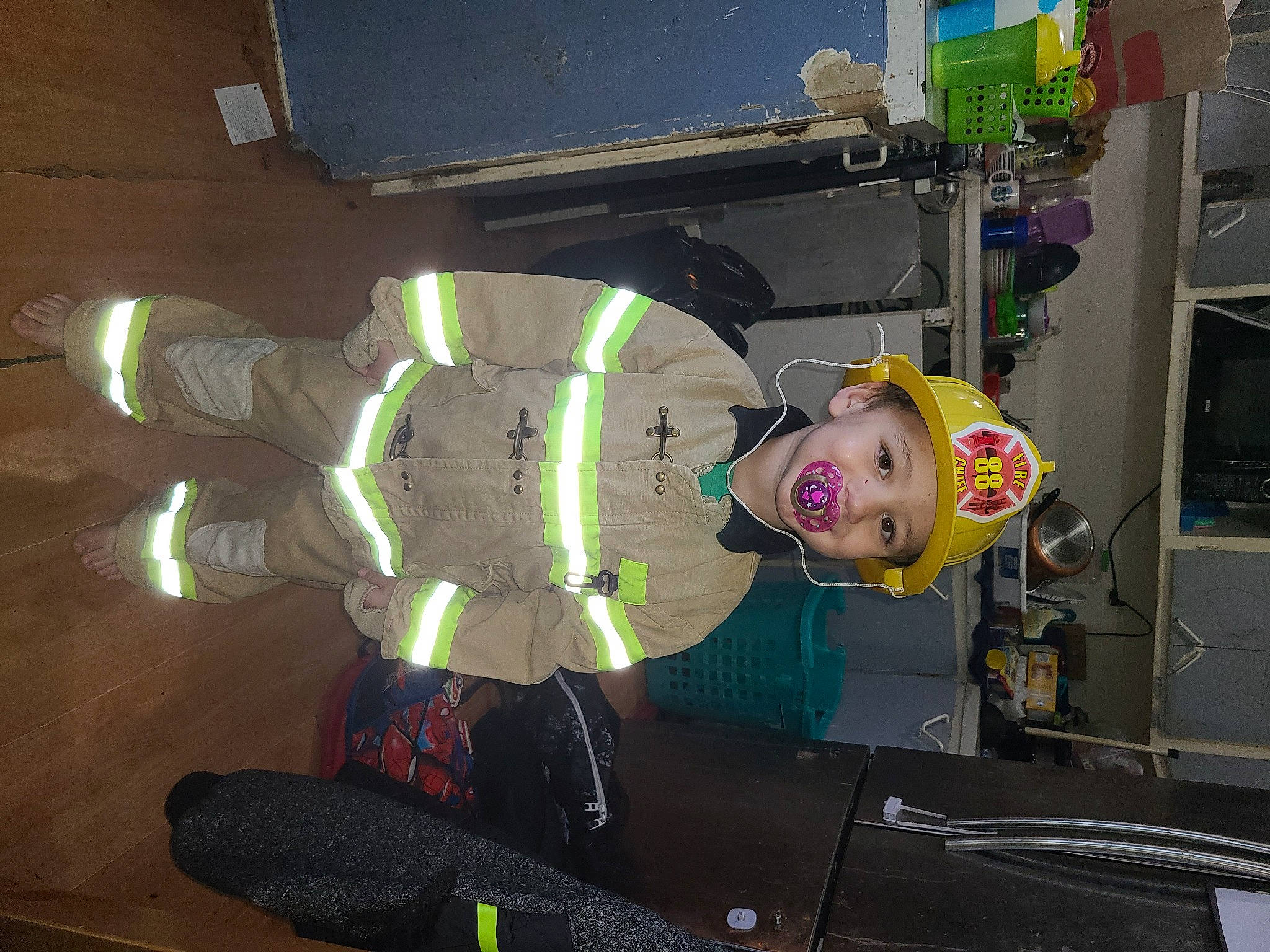 Ayden Rex participe au concours pour gagner de l'argent avec cette photo : animation, auto_part, automotive_wheel_system, costume, fun, gas, glove, headwear, helmet, machine, person, personal_protective_equipment, plastic, room, space, toddler, toy, vehicle_door