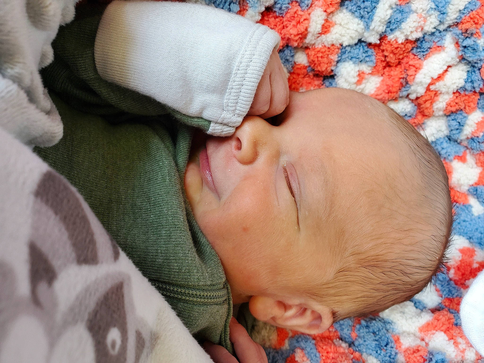 Rhett is registered to the contest to win money with this photo: baby, baby_sleeping, baby_toddler_clothing, bedtime, cheek, child, close_up, comfort, knitting, linens, lip, nap, nose, pattern, person, skin, sleep, textile, toddler, wool