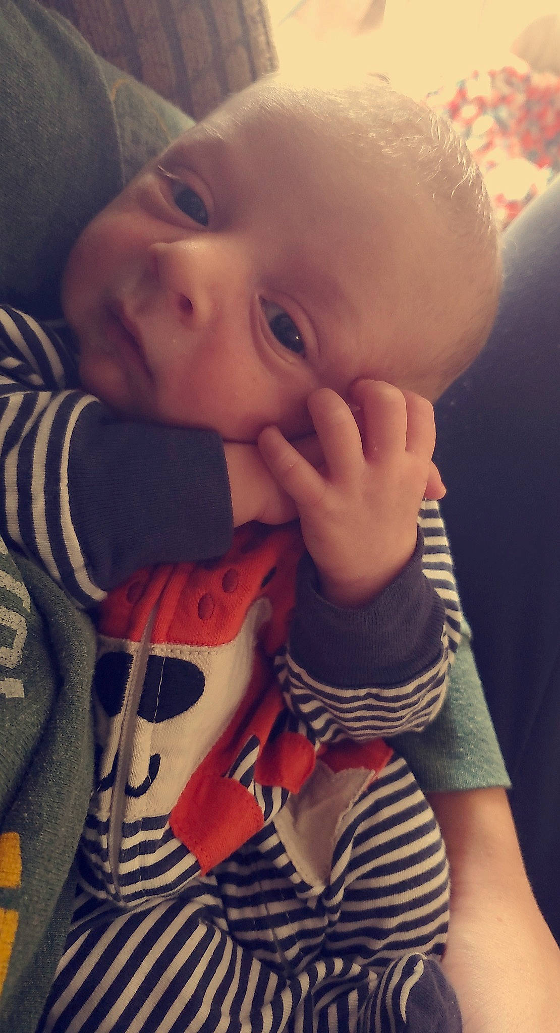 Rhett is registered to the contest to win money with this photo: baby, baby_products, baby_toddler_clothing, cheek, child, cool, eyelash, finger, hoodie, lip, nail, person, skin, sweater, thumb, toddler
