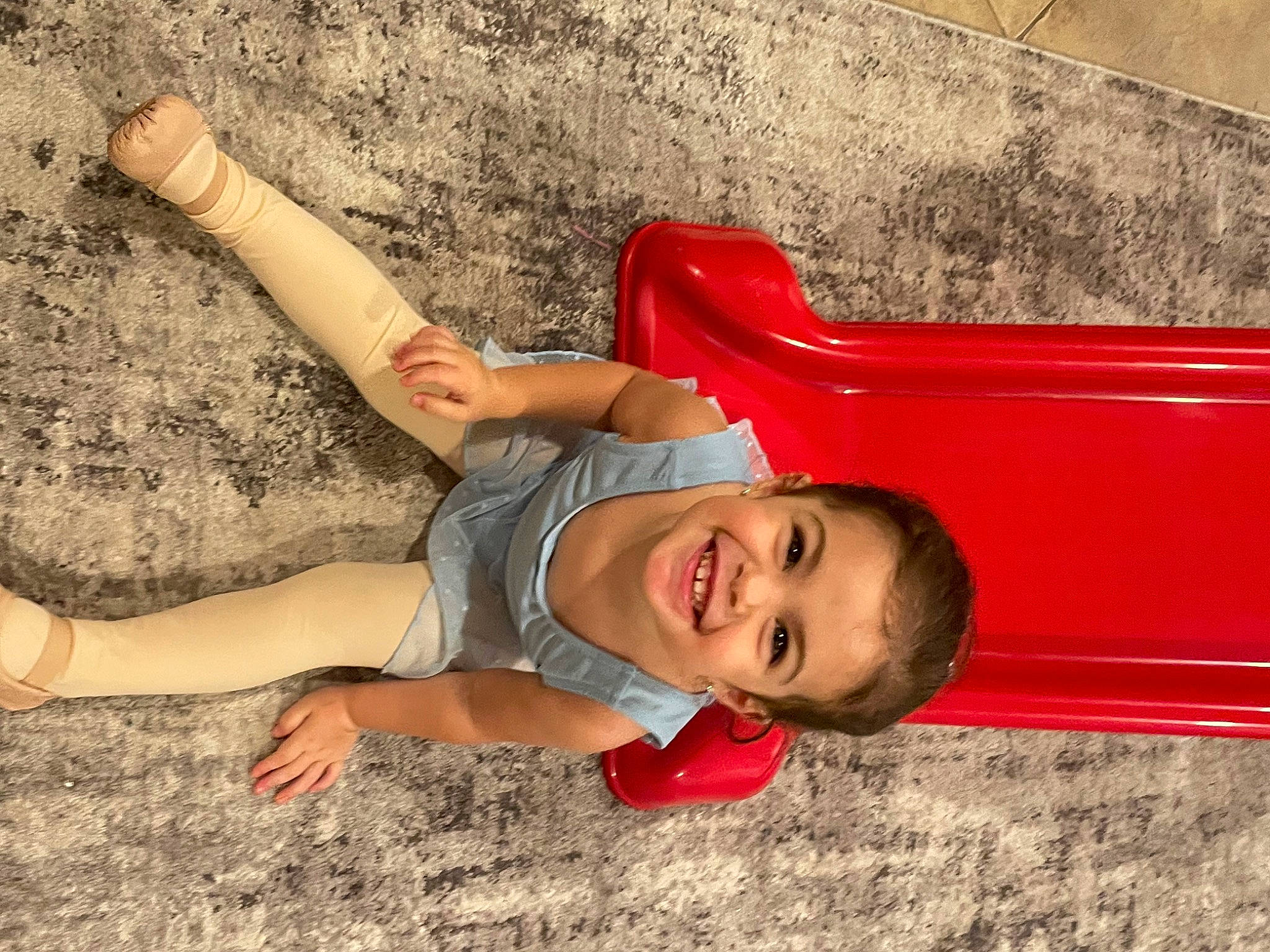 Presley is registered to the contest to win money with this photo: barefoot, child, foot, fun, grass, happy, human_body, human_leg, joy, leg, leisure, organ, people_in_nature, person, play, sand, smile, soil, thigh, toddler