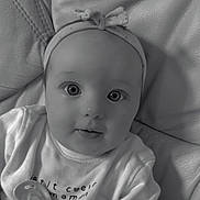 Kelya a rejoint le concours — aidez-le/la à gagner de superbes lots ! baby, infant, headband, pacifier, closeup, black_and_white, cute, eyes, face, expression, clothing, soft_texture, portrait, child, young, adorable, head, sitting, monochrome, innocence
