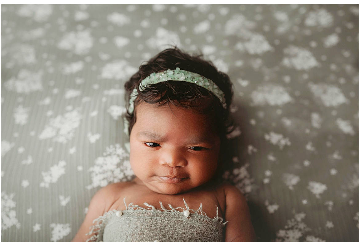 Emme joined the competition — help win amazing prizes! baby, baby_toddler_clothing, bathing, black_hair, bridal_accessory, child, ear, embellishment, eyebrow, eyelash, flash_photography, fun, hair_accessory, happy, headband, headgear, headpiece, jewellery, person, smile