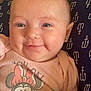 Taylynn is registered to the contest to win money with this photo: baby, smiling, face, infant, clothing, pink, minnie_mouse, cute, hand, cushion, anchor_pattern, lying_down, closeup, child, person, happy, indoors, apparel, head, skin