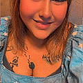 Carmella E.