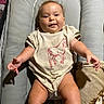 Rane joined the competition — help win amazing prizes! baby, infant, child, smiling, cute, sitting, clothing, shirt, horse_design, blanket, cushion, indoor, furniture, person, face, head, legs, arms, happy, skin