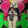 Levi joined the competition — help win amazing prizes! child, person, costume, bunny, chair, flower, pink, green, glasses, smile, indoor, playful, festive, young, happy, portrait, seat, background, fun, holiday