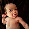 Kylowe is registered to the contest to win money with this photo: baby, infant, naked_torso, face, skin, arm, hand, blanket, expression, newborn, child, lying_down, cute, portrait, human, curious, young, small, indoors, resting