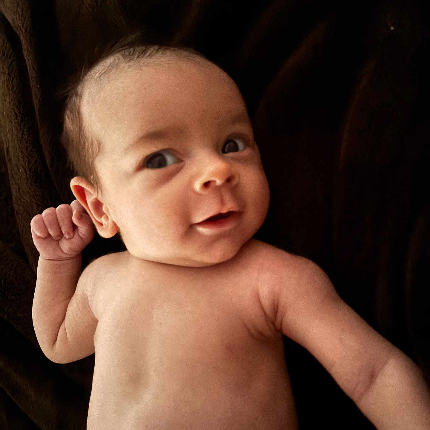 Kylowe is registered to the contest to win money with this photo: baby, infant, naked_torso, face, skin, arm, hand, blanket, expression, newborn, child, lying_down, cute, portrait, human, curious, young, small, indoors, resting