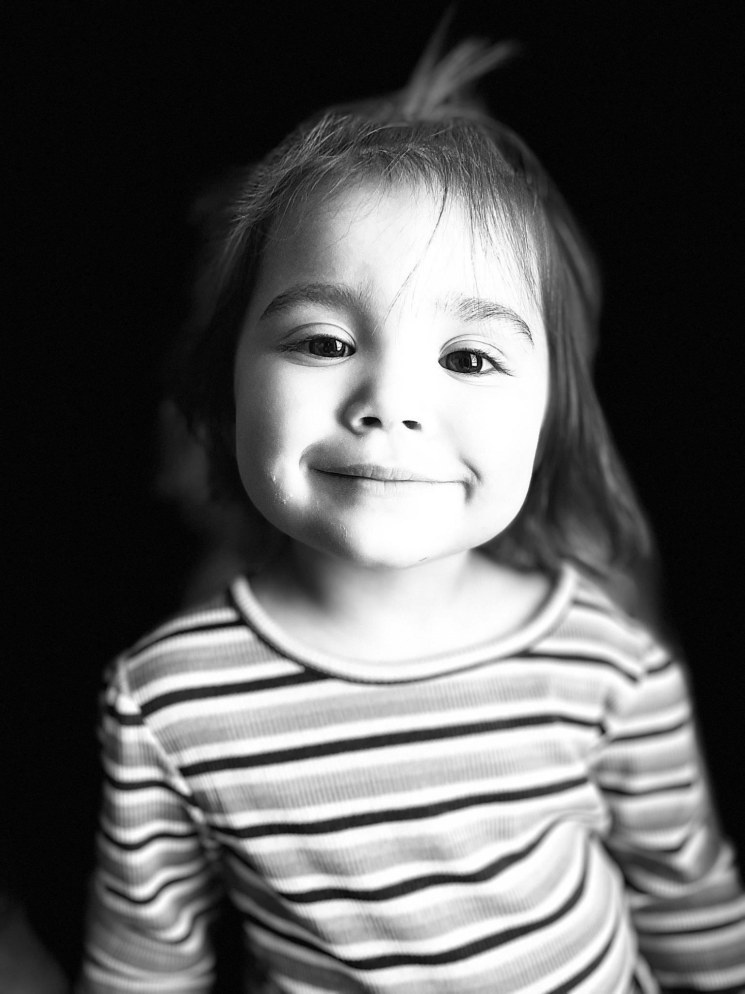 Ava joined the competition — help win amazing prizes! baby, baby_toddler_clothing, beauty, black_and_white, cheek, child, chin, cool, eye, eyelash, flash_photography, fun, happy, iris, nose, person, sleeve, smile, standing, t_shirt