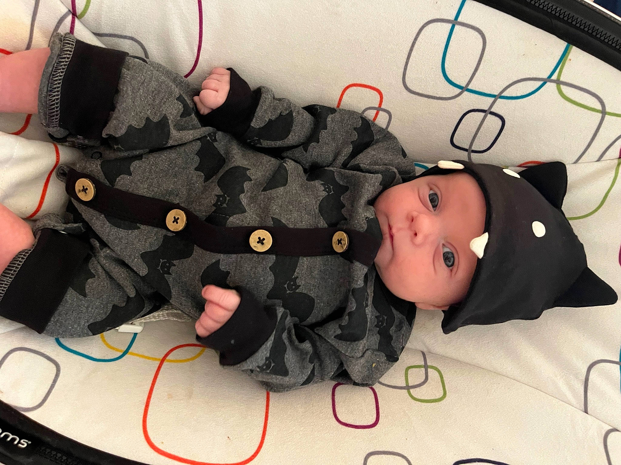 River Lee is registered to the contest to win money with this photo: baby, baby_carriage, baby_products, baby_toddler_clothing, carmine, cheek, child, comfort, fashion_accessory, gesture, hat, headwear, pattern, person, personal_protective_equipment, sleeve, thumb, toddler