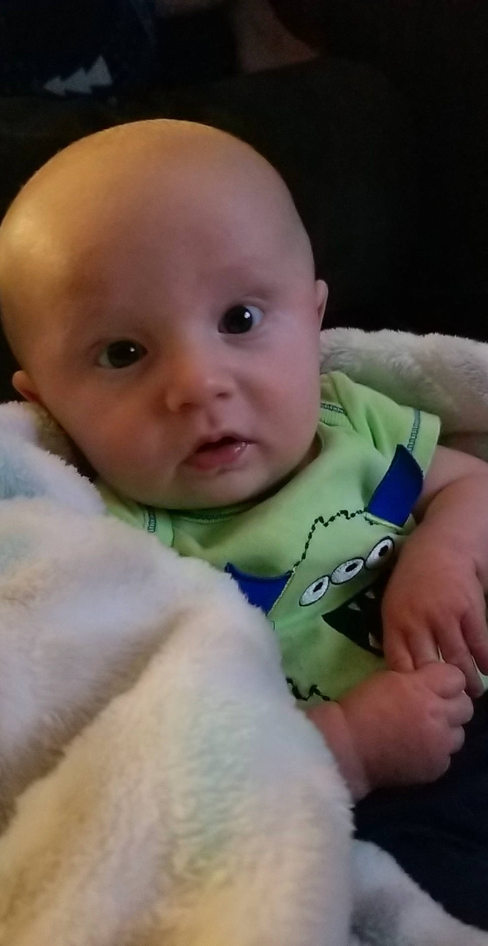 Cedric is registered to the contest to win money with this photo: baby, baby_making_funny_faces, cheek, child, chin, eye, eyebrow, face, facial_expression, forehead, hand, head, iris, lip, mouth, nose, person, product, skin, smile