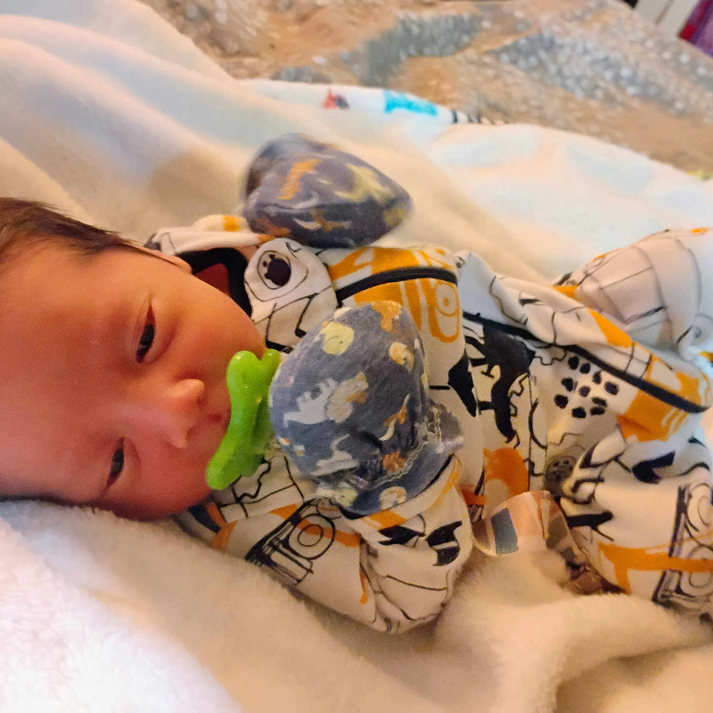 Alejandro is registered to the contest to win money with this photo: baby, bed, blanket, child, clothing, cozy, cute, cute_face, indoors, infant, mittens, newborn, onesie, pacifier, peaceful, portrait, resting, sleeping, soft, tiny