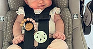 Adelyn joined the competition — help win amazing prizes! baby, car_seat, infant, child, seatbelt, polka_dot, hand, nails, red_nails, pink_clothing, foot, sitting, cute, smile, indoor, safety, parent, newborn, toddler, comfort