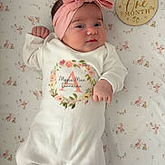 Alyzia-Mae joined the competition — help win amazing prizes! animal_pattern, baby, blanket, child, cute, decor, face, hand, headband, infant, lying_down, milestone, newborn, one_month, pink_bow, portrait, sleepwear, soft_lighting, white_outfit, wooden_plaque