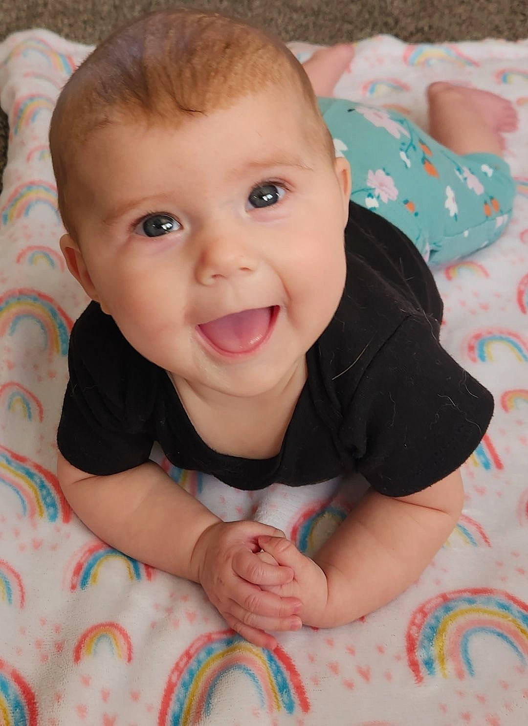 Kyleigh is registered to the contest to win money with this photo: azure, baby, baby_toddler_clothing, cheek, chin, eye, face, facial_expression, hair, head, iris, lip, mammal, mouth, nose, person, product, skin, sleeve, smile