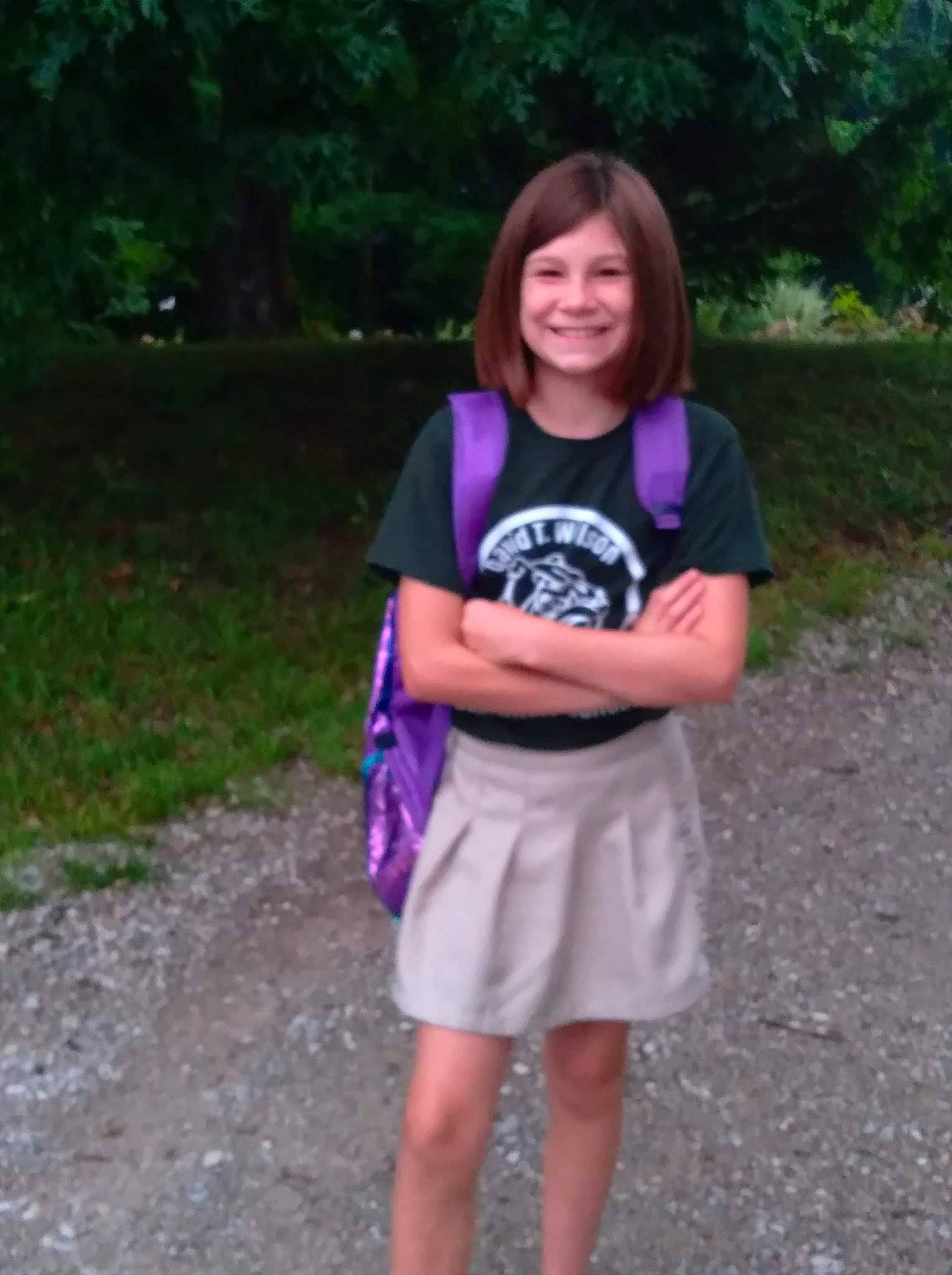 Kiara is registered to the contest to win money with this photo: clothing, electric_blue, face, grass, happy, head, joy, leaf, leisure, magenta, person, pink, plant, recreation, shorts, sleeve, smile, t_shirt, thigh, tree