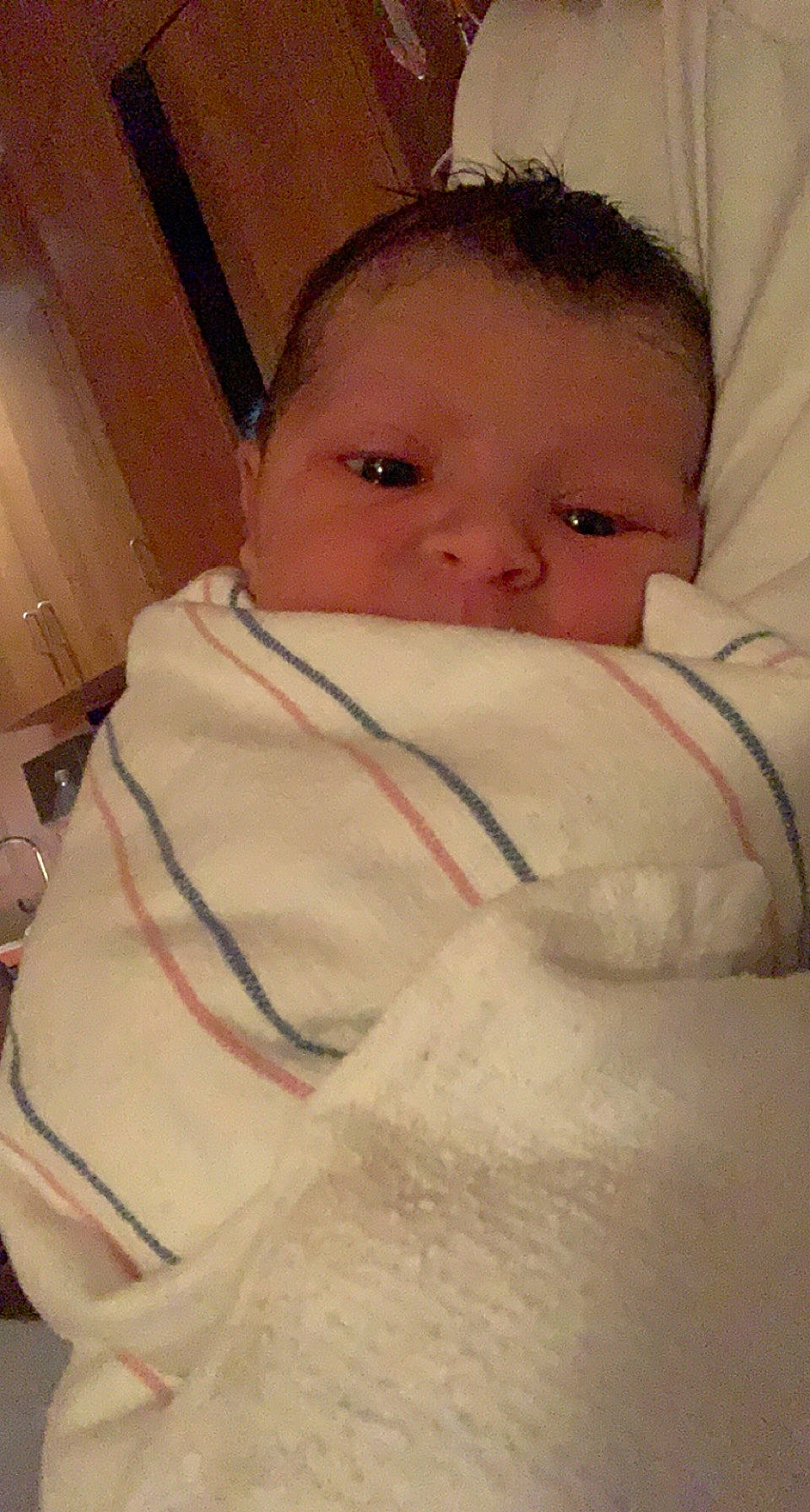 Matteo is registered to the contest to win money with this photo: baby, baby_toddler_clothing, bedding, cheek, child, comfort, eyebrow, eyelash, face, finger, fur, iris, linens, lip, mouth, neck, nose, person, skin, sleeve