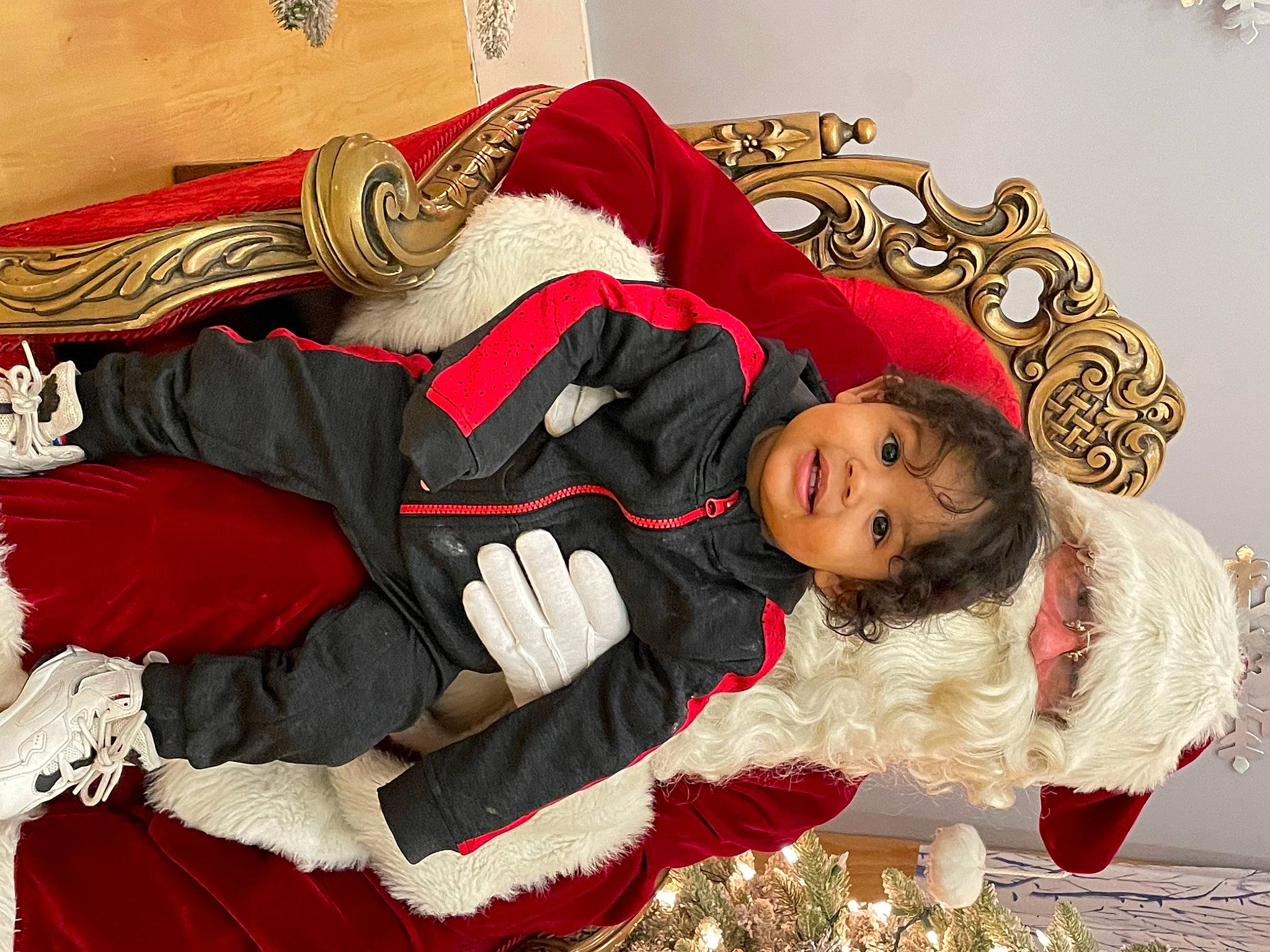 Brycen is registered to the contest to win money with this photo: carmine, child, cosplay, costume, costume_design, dress, event, fashion_design, fictional_character, flooring, fun, fur, happy, pattern, person, red, room, sleeve, textile, toddler