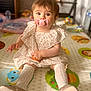 Camellia participe au concours pour gagner de l'argent avec cette photo : baby, child, girl, pacifier, bows, dress, socks, shoes, toy, playmat, indoor, floor, cute, portrait, sitting, infant, person, colorful, young, home