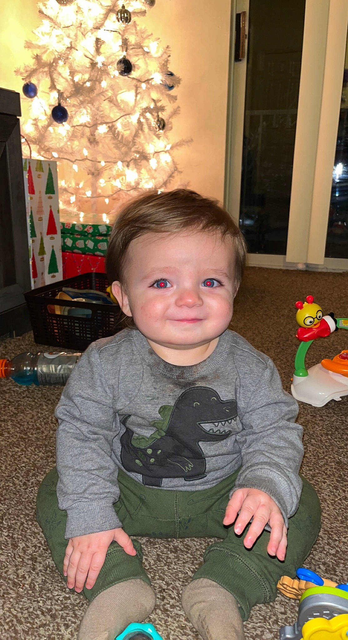 Xavier joined the competition — help win amazing prizes! baby, baby_toddler_clothing, cheek, child, event, floor, flooring, fun, happy, holiday, iris, joy, lap, person, room, sitting, sleeve, smile, standing, toddler