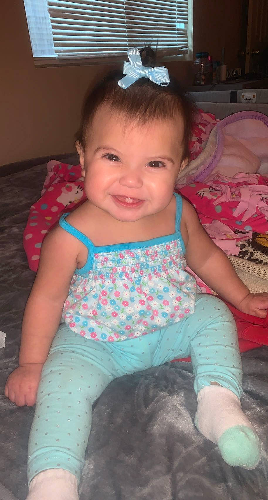 Araya joined the competition — help win amazing prizes! baby, baby_toddler_clothing, cheek, chin, eye, face, facial_expression, green, happy, head, iris, joy, leg, mouth, nose, organ, person, pink, product, skin