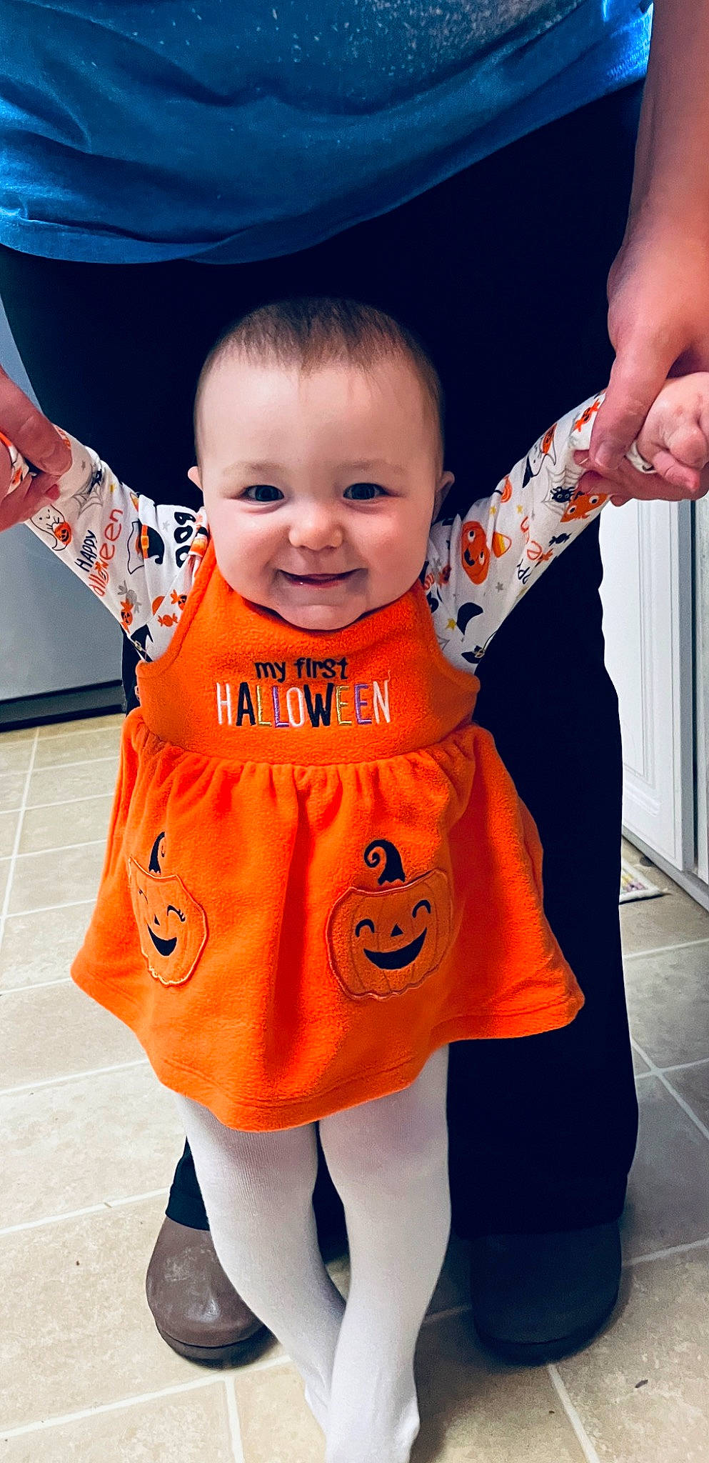 Gracelee joined the competition — help win amazing prizes! baby, baby_toddler_clothing, child, cool, facial_expression, finger, fun, gesture, hand, happy, joy, orange, outerwear, people, person, photograph, sleeve, smile, standing, t_shirt