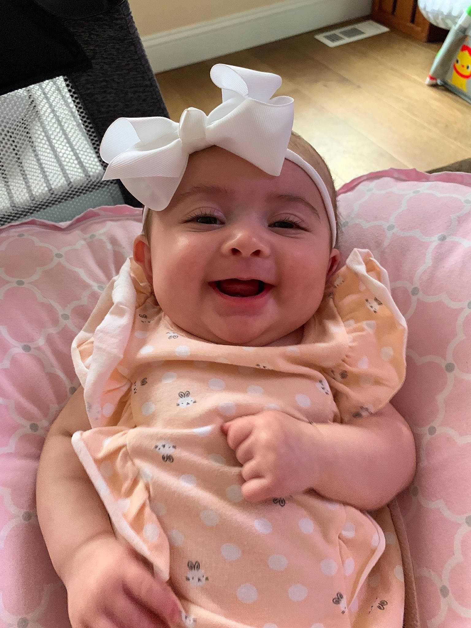 Lyanna is registered to the contest to win money with this photo: baby, baby_toddler_clothing, birth, cheek, child, ear, head, headgear, headwear, person, pink, skin, smile, toddler