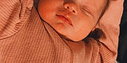 Parker is registered to the contest to win money with this photo: baby, bed, blanket, child, cozy, cute, face, halloween_theme, indoors, infant, mummy, pacifier, peaceful, pink_clothing, portrait, pumpkin, resting, ribbed_fabric, sleeping, soft_lighting