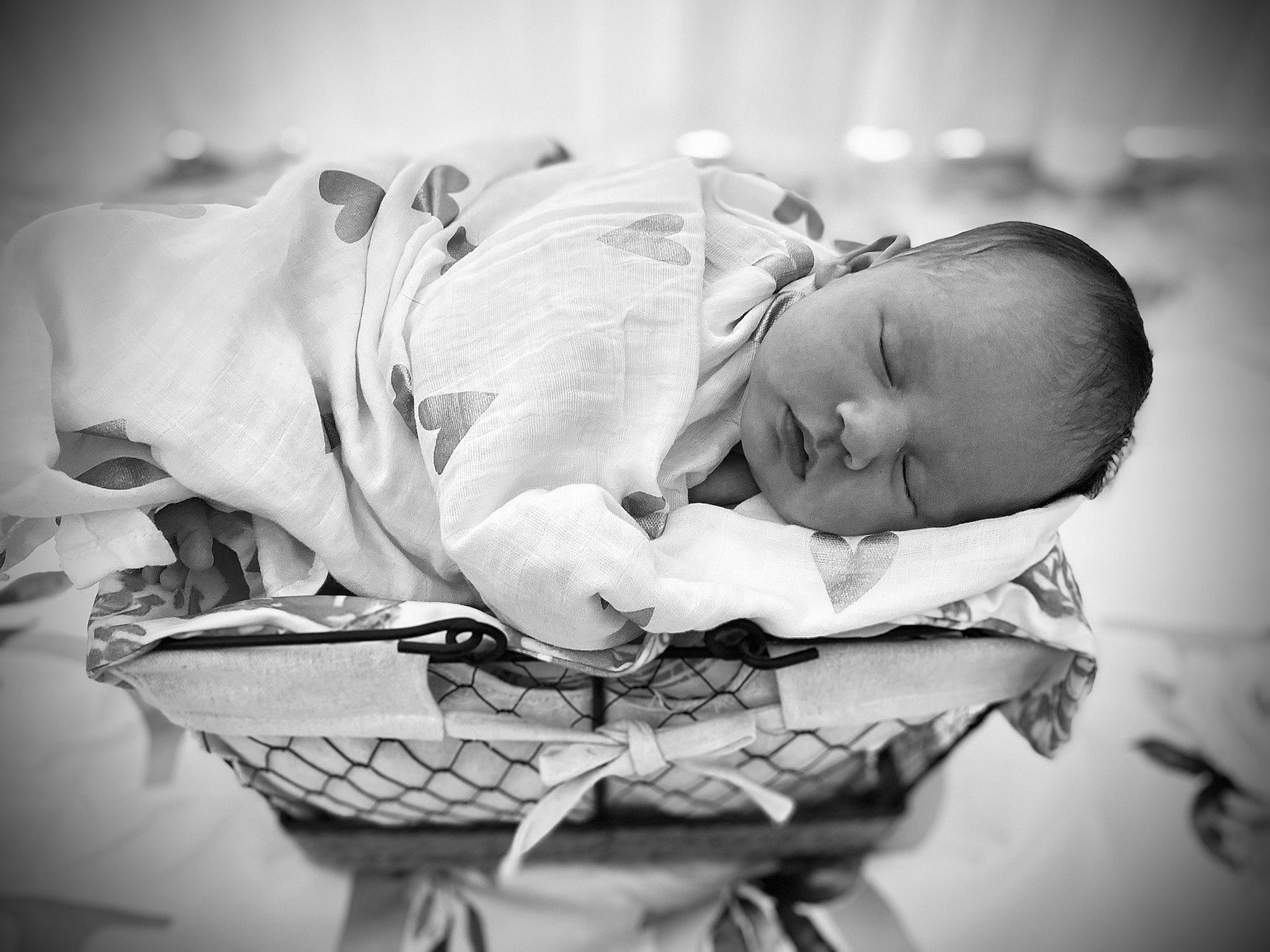 Mallorie is registered to the contest to win money with this photo: baby, black_and_white, child, cloud, comfort, eye, flash_photography, gesture, hand, happy, head, human_body, monochrome, monochrome_photography, person, room, sitting, sky, style, toddler