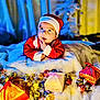 Shaurya joined the competition — help win amazing prizes! baby, blanket, candy, celebration, child, chocolate, christmas, curious, cute, festive, gift_box, holiday, holiday_decor, indoors, portrait, red_clothing, santa_hat, smiling, soft_texture, winter