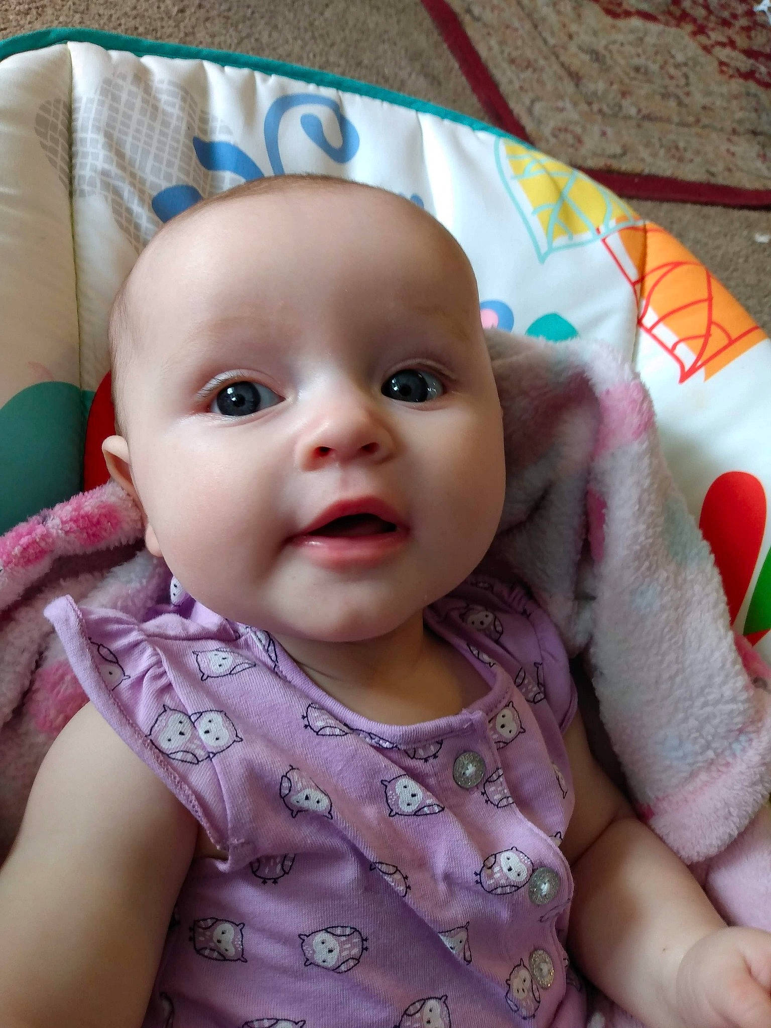 Kimora is registered to the contest to win money with this photo: baby, cheek, child, eye, face, head, iris, lip, mouth, nose, person, pink, skin, textile, toddler