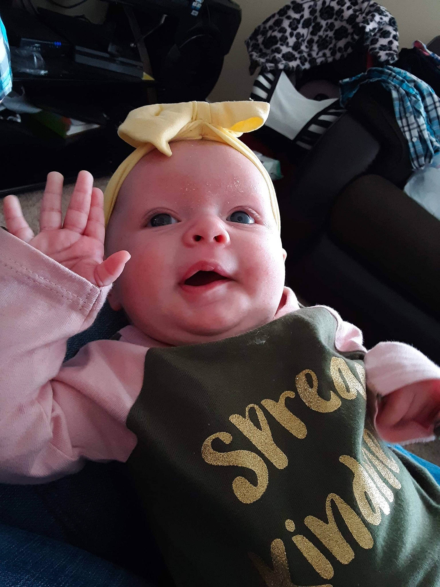 Kimora is registered to the contest to win money with this photo: baby, car_seat, cheek, child, cool, ear, eye, face, finger, hand, head, headgear, lip, person, skin, toddler