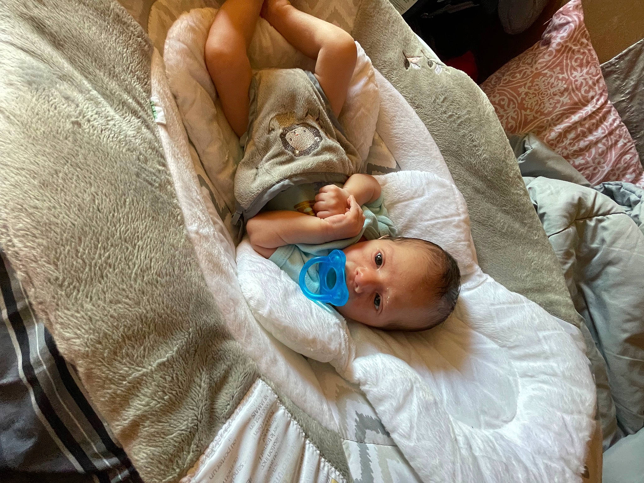 Kameron joined the competition — help win amazing prizes! baby, baby_products, baby_sleeping, baby_toddler_clothing, bedtime, chair, child, comfort, couch, human_leg, linens, nap, person, room, sitting, sleep, toddler, wood