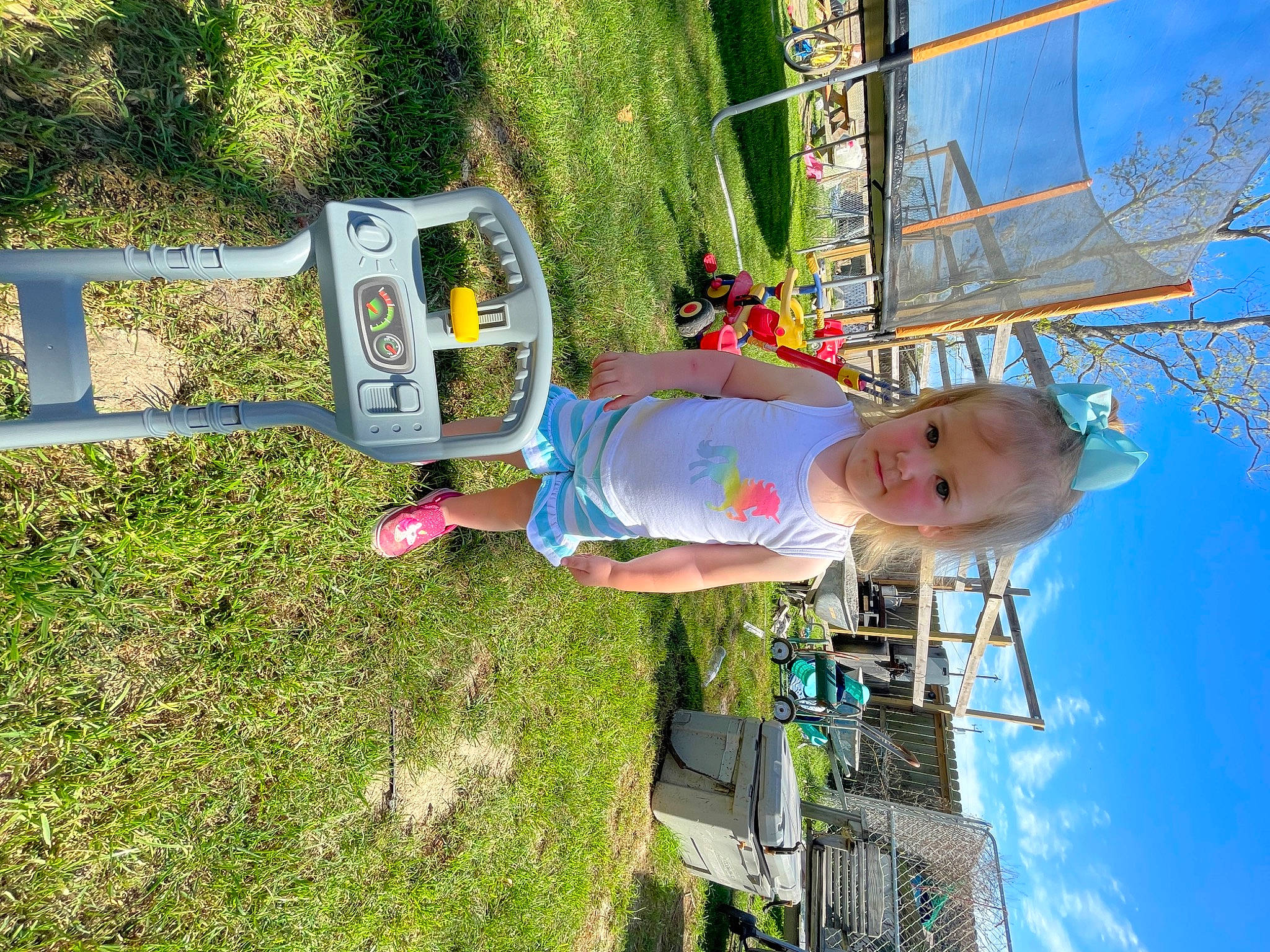Kaileigh joined the competition — help win amazing prizes! baby, child, city, cloud, electricity, fun, grass, hat, house, landscape, leisure, person, plant, pole, public_space, public_utility, recreation, sky, smile, toddler