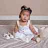 toddler, child, pigtails, white_dress, sandals, brush, basket, blanket, floor, wooden_floor, indoor, portrait, cute, sitting, baby, skin, face, expression, hair, clothing