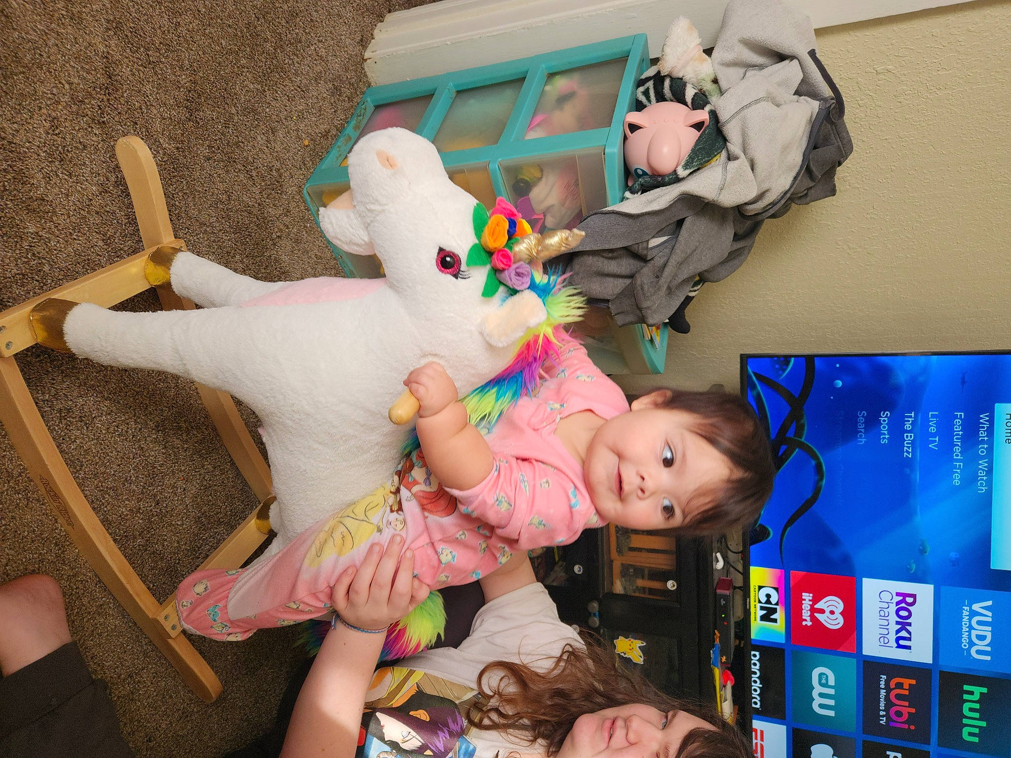 Juliana is registered to the contest to win money with this photo: baby_toys, child, communication_device, fun, happy, lap, leisure, person, photograph, plush, product, room, smile, snapshot, stuffed_toy, toy