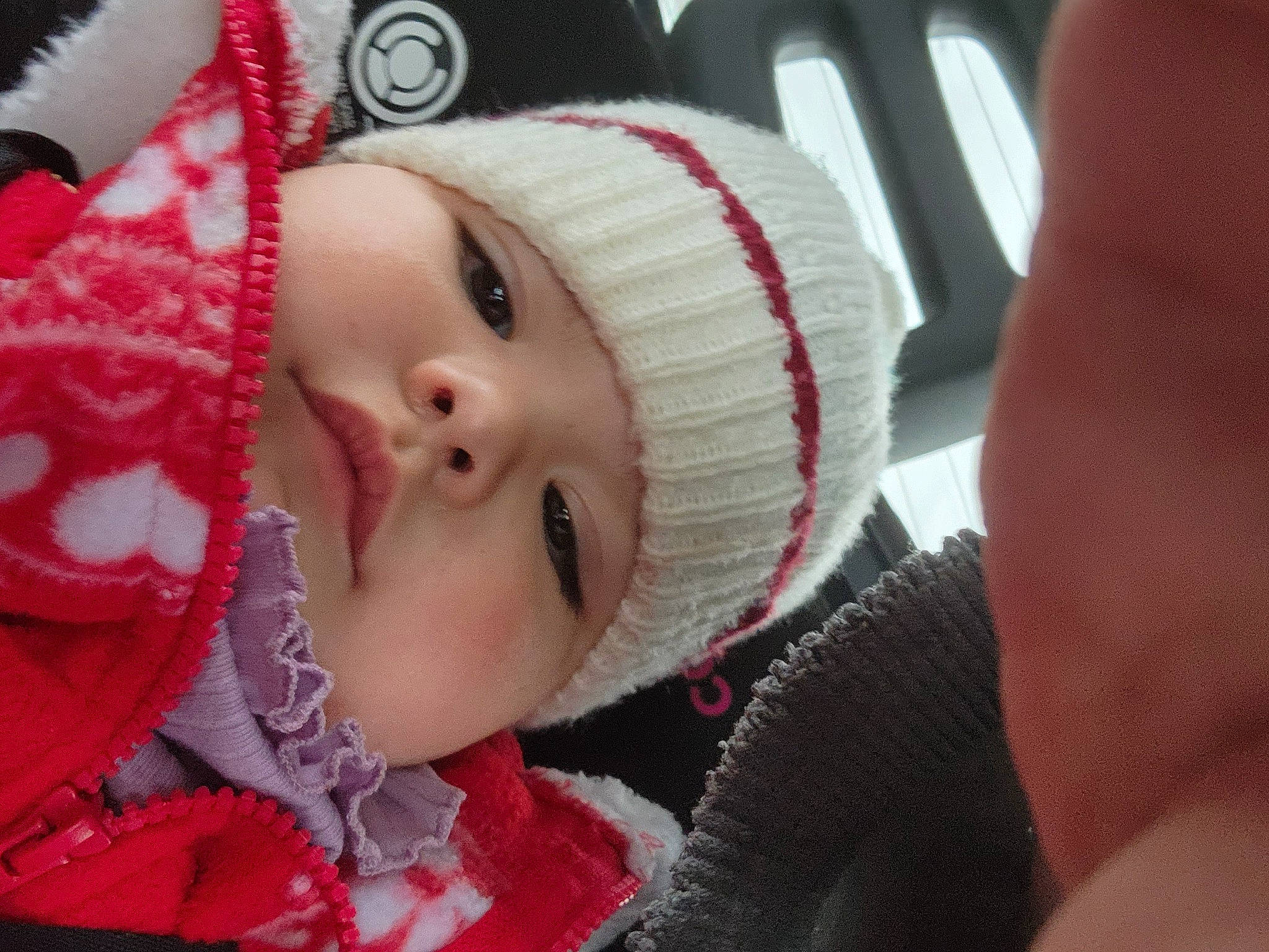 Juliana is registered to the contest to win money with this photo: baby, baby_toddler_clothing, cap, cheek, child, christmas, event, eyelash, freezing, fur_clothing, happy, headgear, headwear, knit_cap, lip, nose, person, santa_claus, skin, toddler