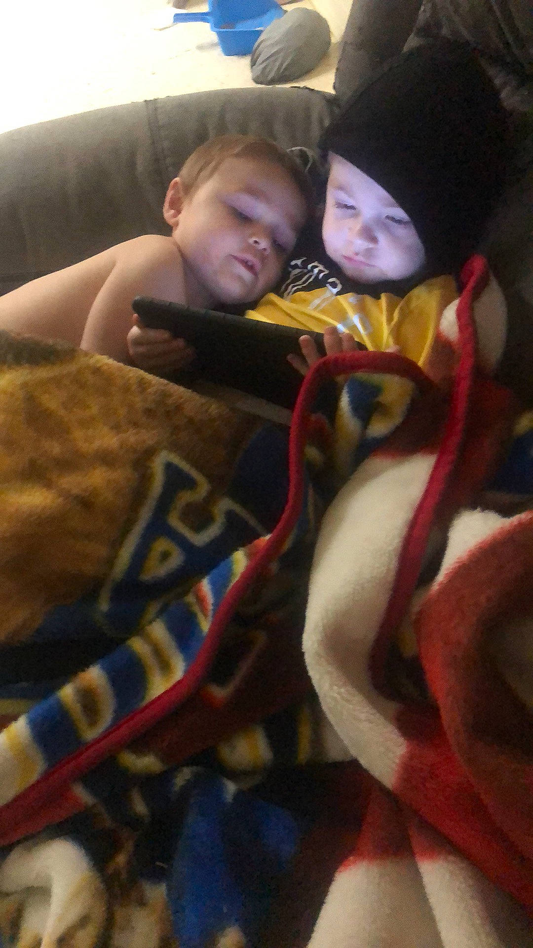 Daniel is registered to the contest to win money with this photo: baby, bedtime, blanket, car_seat, carmine, child, comfort, couch, fictional_character, fun, fur, headwear, lap, linens, nap, person, room, sitting, sleep, toddler