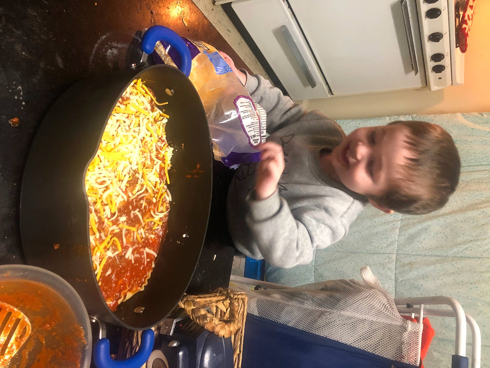 Daniel is registered to the contest to win money with this photo: baking, comfort_food, cooking, cookware_and_bakeware, cuisine, dish, drink, fast_food, food, fun, heat, ingredient, joy, junk_food, kitchen_utensil, person, pizza, plate, recipe, t_shirt
