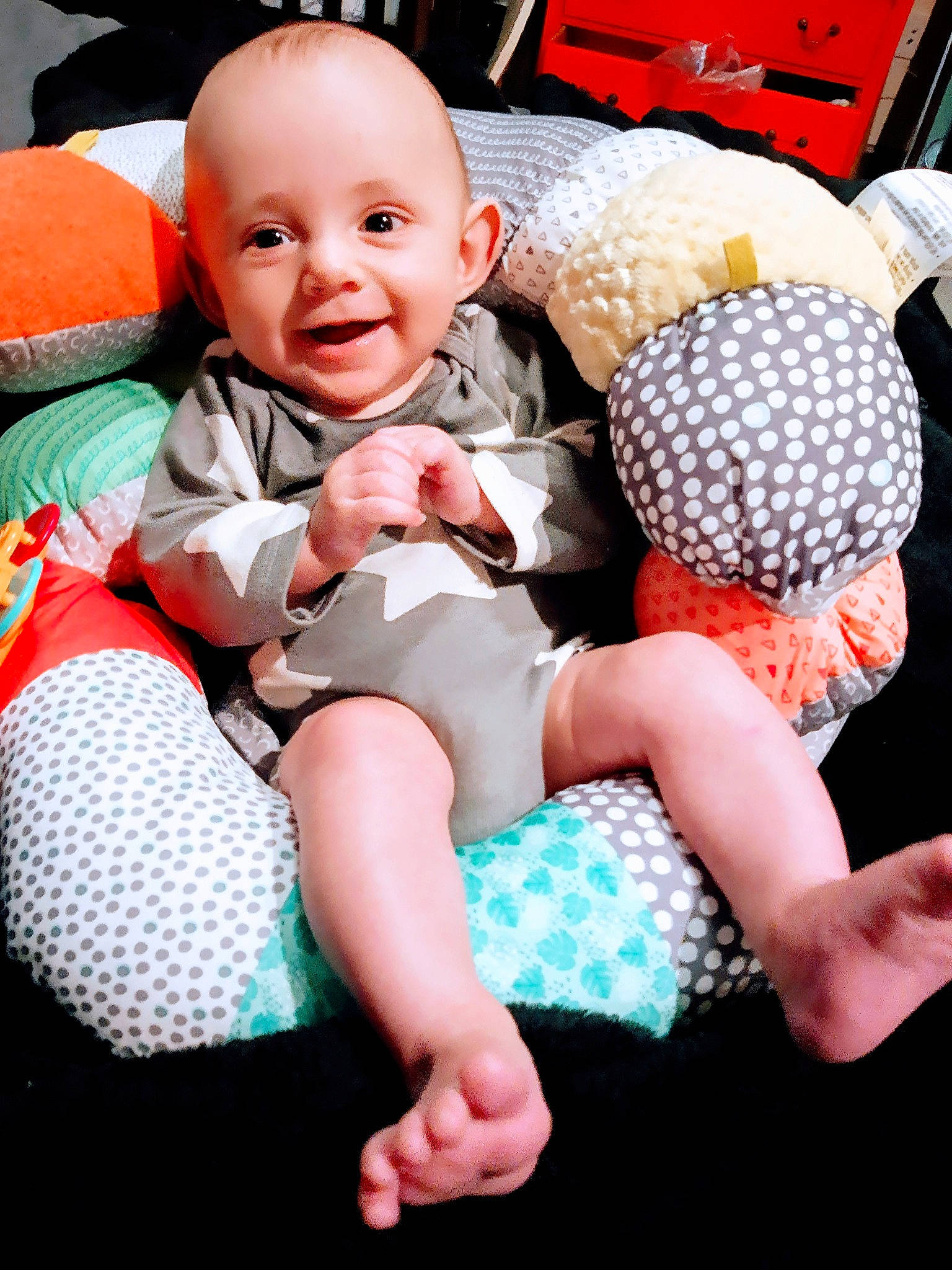 Kailen is registered to the contest to win money with this photo: baby, baby_laughing, baby_products, baby_toddler_clothing, child, comfort, foot, happy, joy, lap, person, plush, sock, stuffed_toy, toddler, toe, toy